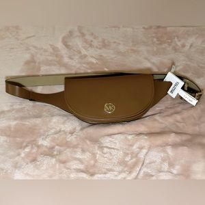 MK brown leather sling pack